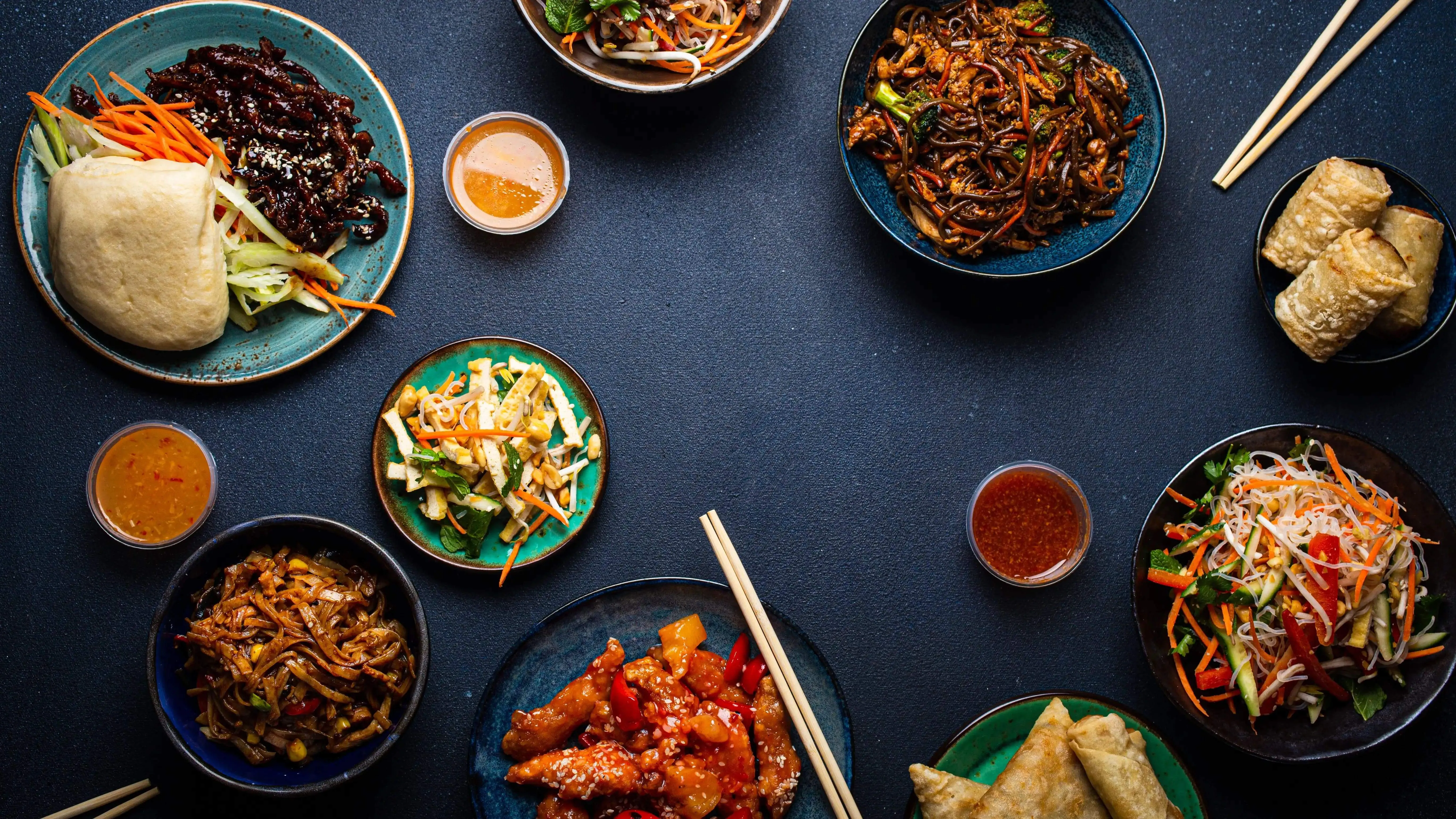 Header Image, shows picture of Various Chinese Food on a Table